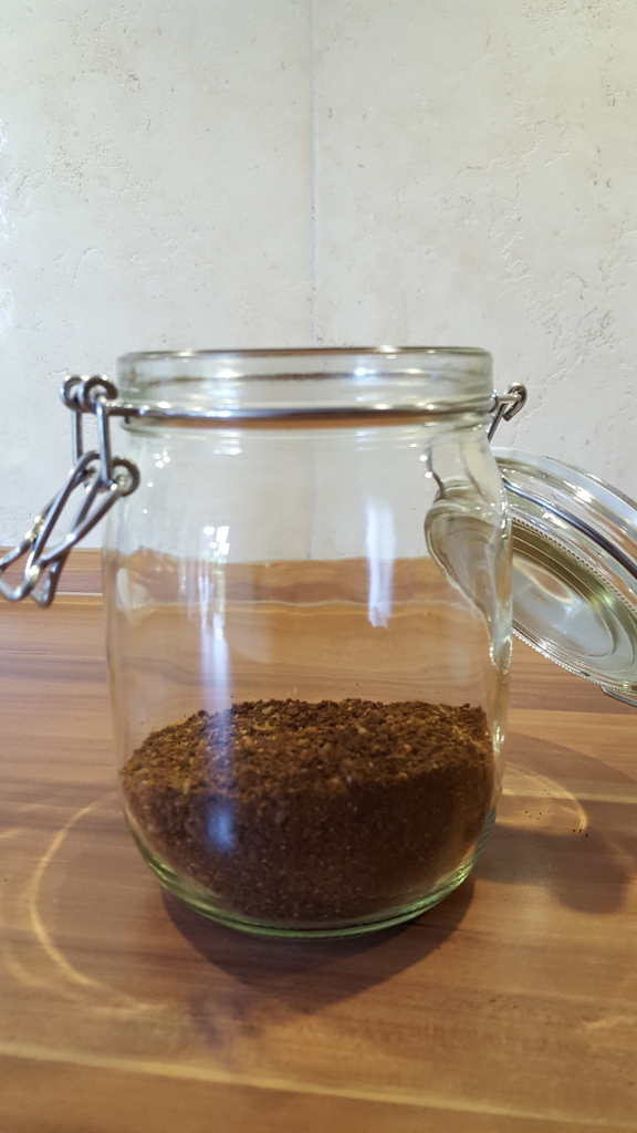 Coffee bean powder in jar